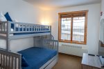 Bedroom 3 - the bunk room features a twin over full bunk bed with twin trundle bed.